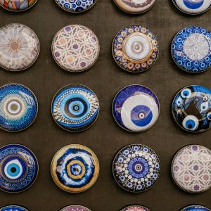 A variety of intricate handmade Turkish ceramic designs arranged in a grid pattern.