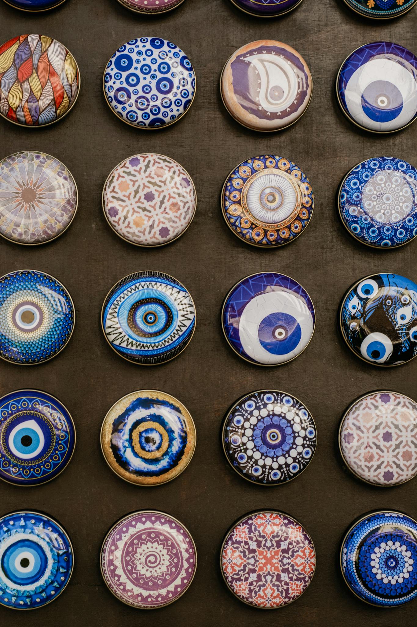 A variety of intricate handmade Turkish ceramic designs arranged in a grid pattern.